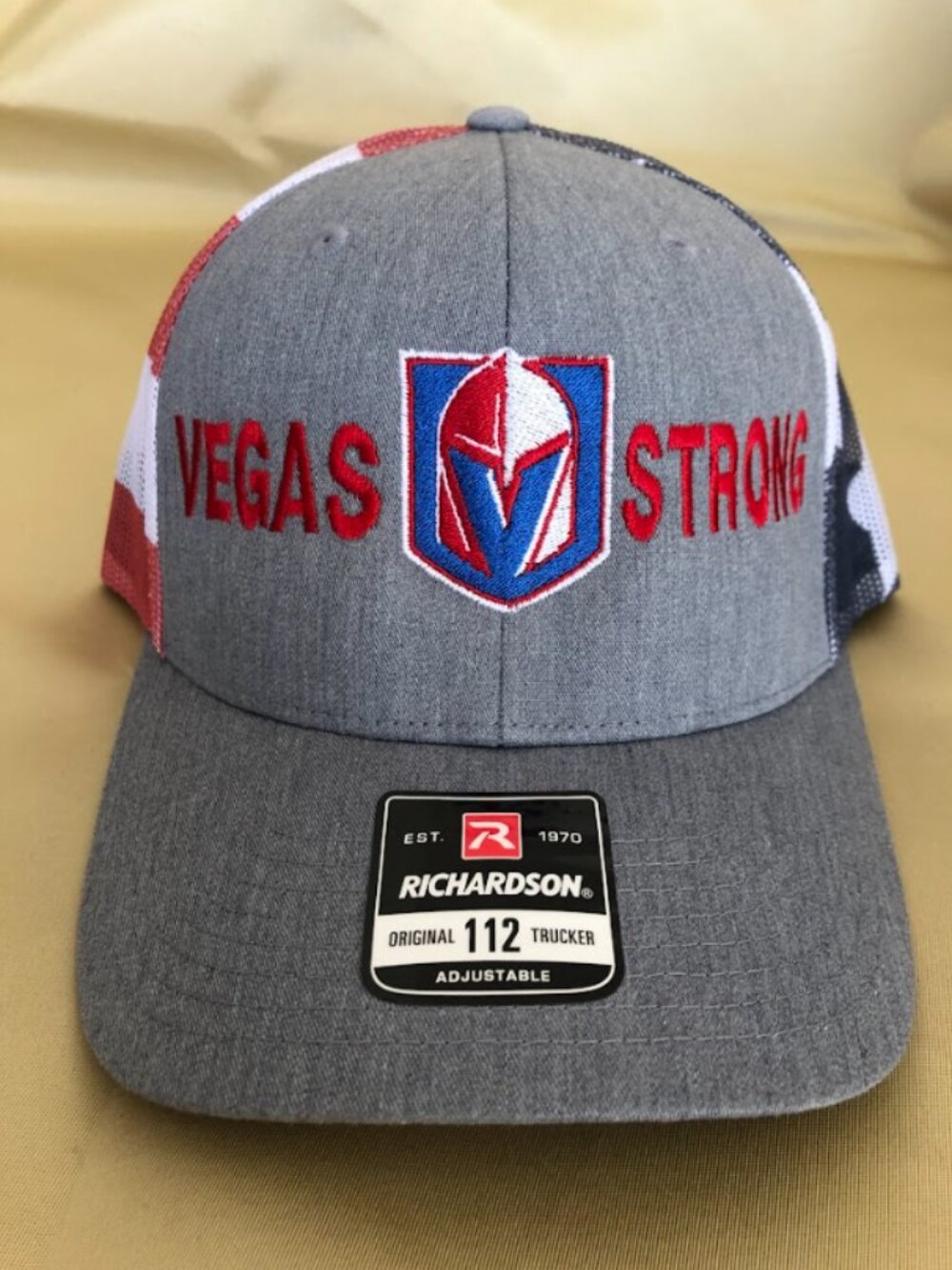 Las Vegas Golden Knights Vegas Strong Grey and USA Mesh Trucker Snapback Hats!